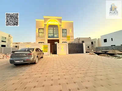For sale, a villa in the Al Amerah area of ​​Ajman, including registration fees and air conditioners, five master bedrooms, building area 3600 square feet, at an excellent price