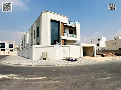 Own a dream villa on a corner lot with two streets, luxurious European design, spacious two floors with a roof terrace, for sale in Al Yasmin