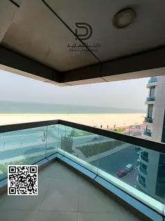 Own a luxurious 3-bedroom apartment with a living room in Corniche Towers, Ajman. Featuring a spacio