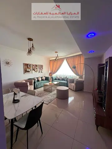 For rent monthly - fully furnished Two-bedroom apartment and living room with hotel furniture - Sharjah - Al Taawun - with internet
