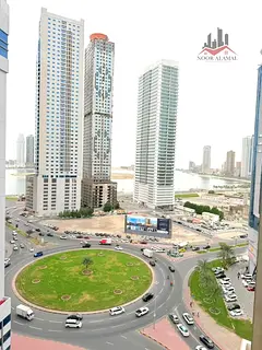 Sharjah, Al Taawun area: Two-bedroom apartment with a living room, kitchen, two bathrooms, and a bal
