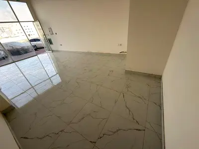 Shop for Annual Rent in Ajman Al Jurf 3 | Prime Location on Main Road Near China Mall and Al Qabail Center | New Building and Large Space | AED 25,000