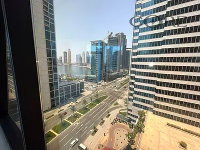 شقة بغرفتي نوم | ماركيز سكوير الخليج التجاري | إطلالة على القناة وبرج خليفة | تخطيط مفتوح