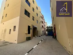 Building for sale in Muwailih area, or a residential building with a cooperative council.