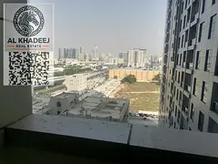 A large room and hall with a balcony and 2 bathrooms in City Towers Al Nuaimiya 3, opposite Grand Ma