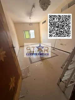 A room and hall in Al Hamidiya 1, opposite the court, annual rent in Ajman