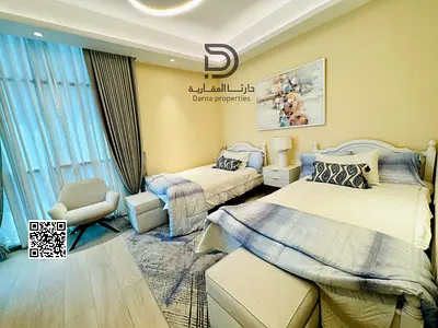 Own a spacious one-bedroom apartment in Creek Towers with an open view of Ajman Creek and the city, ideal for comfortable living and smart investment