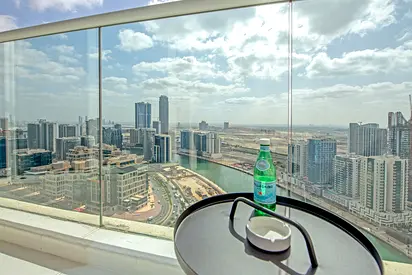 Fully Furnished 1BR | DAMAC Prive | Canal View Balcony | Sofa Bed | All Bills Included
