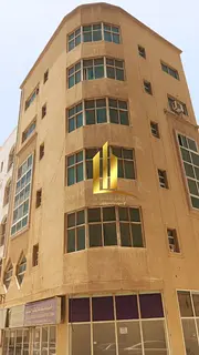 A distinctive investment building Five floors In the Al Majarrah area of Sharjah A building in a pri