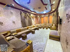 A luxurious villa for sale in Al Rawda 3, Ajman, with a modern and elegant design that combines soph