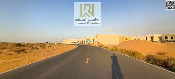 أرض سكني تجاري للبيع في الزاهية – أرضي + 2 على شارع محمد بن زايد مباشرة
