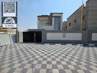 للبيع في عجمان منطقة الروضة 2 فيلا تصميم عصري تكييف مركزي 5 غرف وصالة وصالتين وغرفة خادمة وفناء واسع