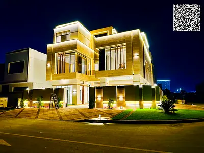 Corner villa with elevator and swimming pool, a privileged location near the mosque, where all means of entertainment are available opposite Al-Hamidiyah Park