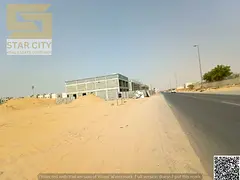 🏗️ Golden Investment Opportunity in Al Helio 2 – Commercial Land Directly on the Main Road!