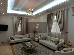 Villa for sale in Sharjah, Al Qarain area The villa is covered with marble.