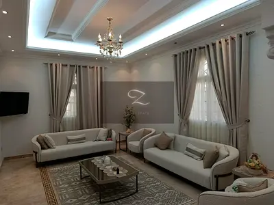 Villa for sale in Sharjah, Al Qarain area The villa is covered with marble.
