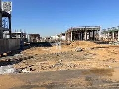 Land for sale in Al Zahia, Ajman, corner plot on a street and alley