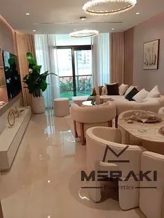 A bedroom and living room apartment with a down payment of only 68,000 AED and at an amazing price i