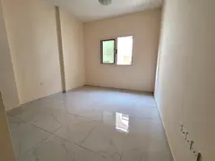 Big one studio apartment with cover parking  separate kitchen  close to  al zahia city center