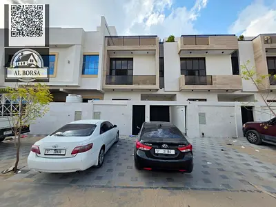Villa for sale in Al Yasmin | 5 bedrooms | 7 bathrooms | Majlis and living room | Kitchen with dining area | Registration fees included | Freehold own