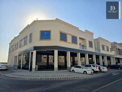 A super deluxe corner building for sale in Al-Hawshi, only a year and a half old and with an excellent return on investment.