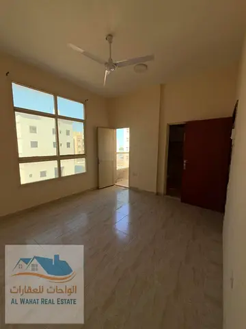 A spacious one-bedroom apartment with a living room and two bathrooms is now available for annual rent in Al-Aliya. It features a balcony and is curre