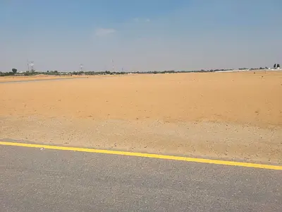 Two residential plots for sale in Sharjah, Al Rahmaniya suburb, Mazir'ah B area.