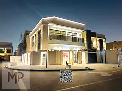 For sale - Two floors - with a roof - Price includes registration fees - Near Sheikh Mohammed Bin Za