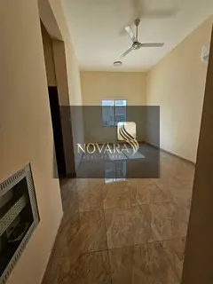 Apartment for annual rent: one bedroom, living room, two bathrooms, and a balcony in Al Jurf Industr