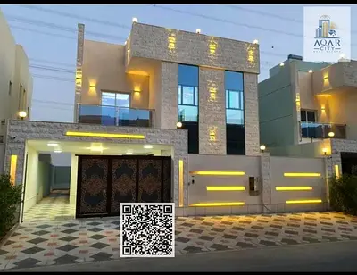 A villa in the prime residential area of ​​Al Helio 2. Registration fees included, directly on Sheikh Mohammed bin Zayed Road, with no down payment, a