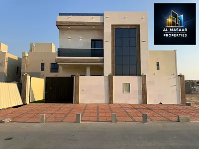 At a bargain price, a two-story villa with a roof near the mosque from the most luxurious villas in Ajman, designed like a palace with super deluxe fi