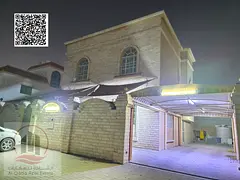 Villa for sale in Al Rawda 3, Ajman. Modern design. The villa features 5 master bedrooms, a majlis (