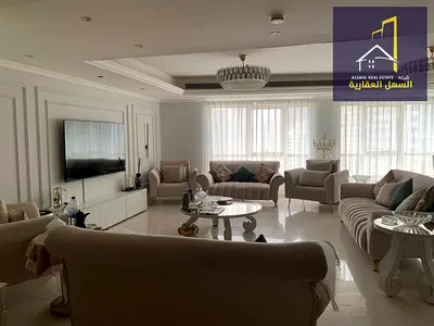 For sale, a 4-bedroom apartment with a hall in Al Majaz 3, with a direct view of Al Qasba