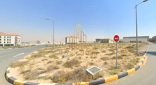 Commercial land in a golden location on 3 streets - garden view - close to schools and services