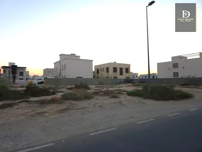 For Sale in Sharjah Al Houshi Area (Al Badi Suburb) Residential Land Area: 5095 sq ft Permit: Ground + First Floor On an 18-meter wide street Fr