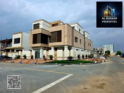 3-story villa on a corner lot with two street frontages, VIP finishing, elevator, ready with air conditioning, fees included, freehold ownership