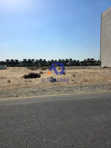 أرض تجارية بجوار الجادة والزاهية