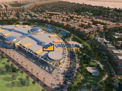 قطعة أرض سكنية مع تاون هاوس قيد الإنشاء ( إنجاز 35%)