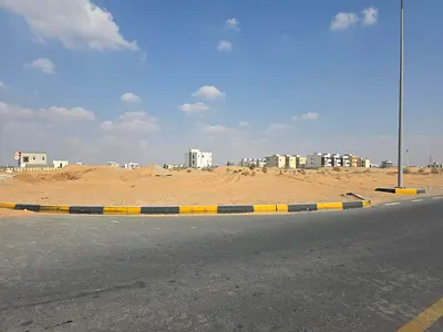 Two residential plots for sale in Sharjah, Al Dibdibah area, south of Al Rahmaniyah suburb.