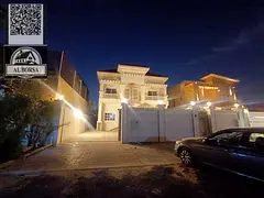 Villa for rent in Al Muwaihat 1, Ajman, consisting of 5 master bedrooms, a majlis, a living room wit