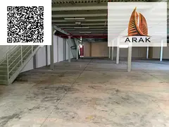 For annual rent, a large warehouse is available in Al Jurf Industrial 1