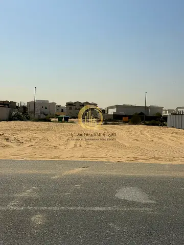 For sale: residential land in Sharjah, Al Houshi area. Land area: 10,000 sq. ft. Very prime location on a paved street, close to all services, eas