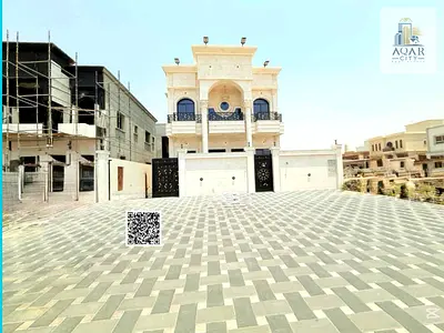 Classic villa, including registration and ownership fees, two floors and a roof with a wonderful sitting area, free ownership for everyone. Own one of the most beautiful villas in Ajman at a price wit