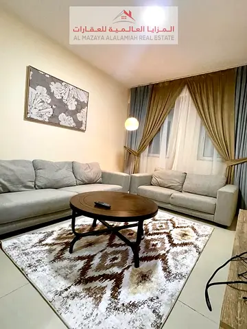 for rent monthly A fully furnished One-bedroom Two-bathroom apartment in Al Majaz3