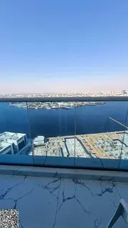 Studio apartment for sale in Al Waha Towers, furnished with a balcony, for 350,000.