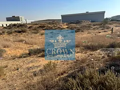 **For Sale: Premium 31940 sqft Corner Industrial Land in Emirates Modern Industrial Area, Umm Al Quw
