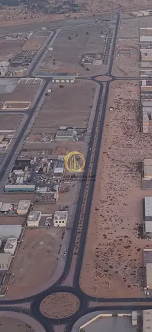 For sale: Corner land in the Emirates Industrial City in Al Sajaa. Strategic location, Block 2, Scrap and Auctions Street. Land area: 114,040 sq ft