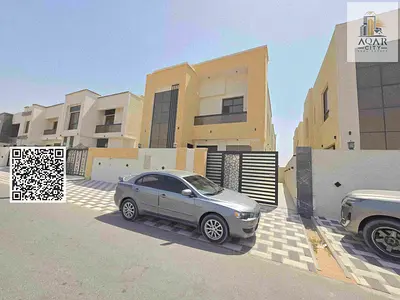 For sale, a corner villa - two floors, including registration fees, close to Sheikh Mohammed bin Zayed Road - freehold for all nationalities with the right of inheritance to children for life
