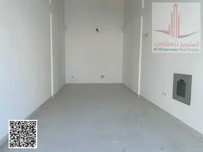 Shop for Rent in Al Jurf Industrial Area Modern Building Large Area Excellent Finishing Prime Location Suitable for All Commercial Activities