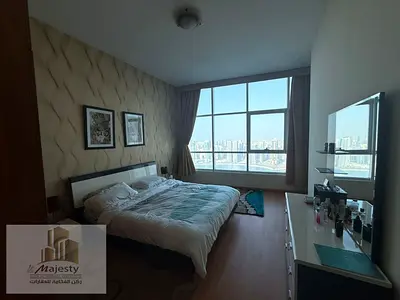 🌊 For sale: a unique apartment in Palm Tower 1 with a direct front view of Al Mamzar Lake, two bedrooms, a large living room, an additional lounge, a